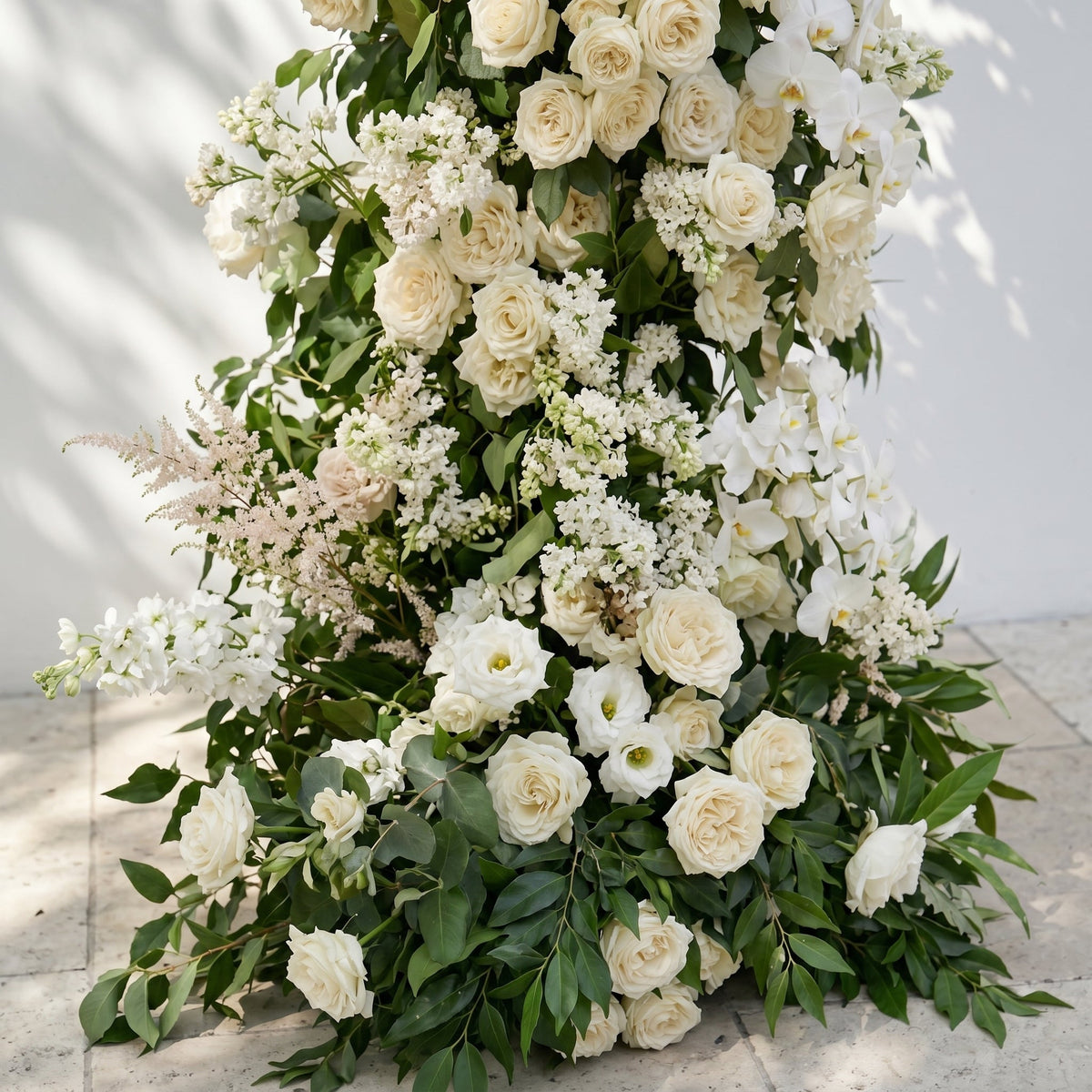 Calnora: Luxury Ivory White, Cream & Fresh Green Silk Floral Ground Horn Arch Arrangement with Flowing Cascading Astilbe Greenery for Romantic Minimalist Weddings & Garden Event Decor Frame Included