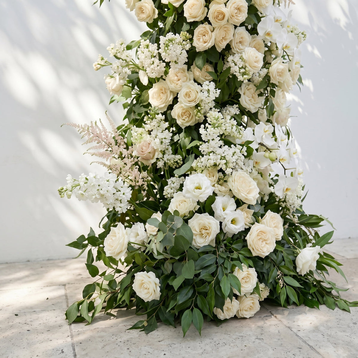 Calnora: Luxury Ivory White, Cream & Fresh Green Silk Floral Ground Horn Arch Arrangement with Flowing Cascading Astilbe Greenery for Romantic Minimalist Weddings & Garden Event Decor Frame Included