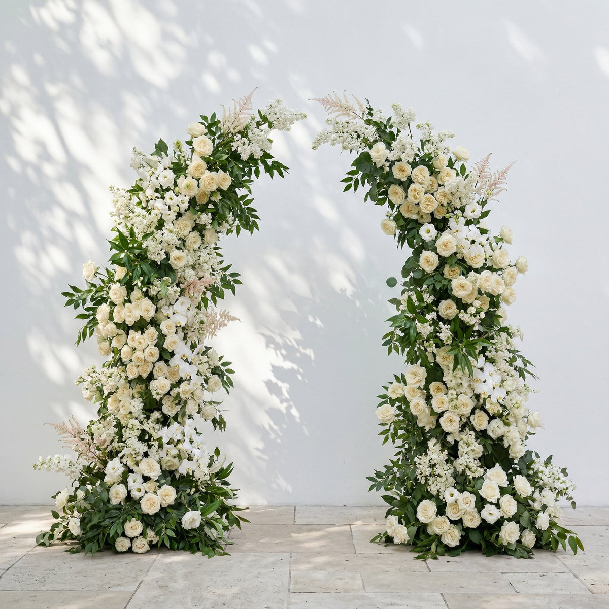 Calnora: Luxury Ivory White, Cream & Fresh Green Silk Floral Ground Horn Arch Arrangement with Flowing Cascading Astilbe Greenery for Romantic Minimalist Weddings & Garden Event Decor Frame Included