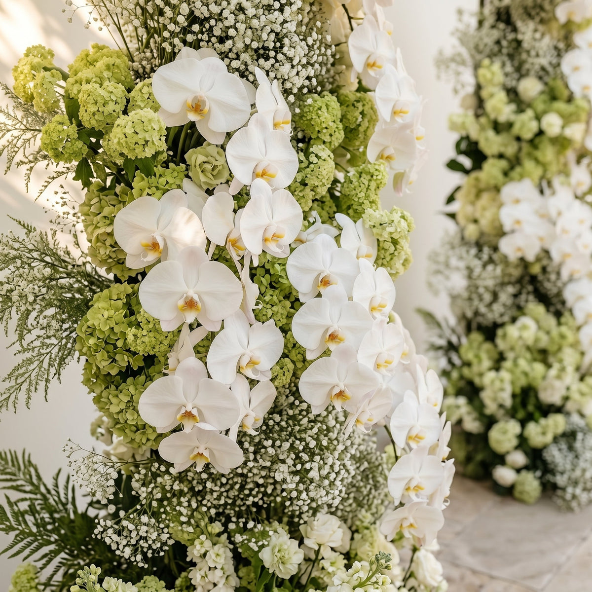 Maellyra:Ivory White Orchid & Fresh Green Silk Floral Ground Horn Arch Arrangement with Soft Sorelia & Cascading Lush Greenery for Romantic Minimalist Weddings & Garden Event Decor Frame Included