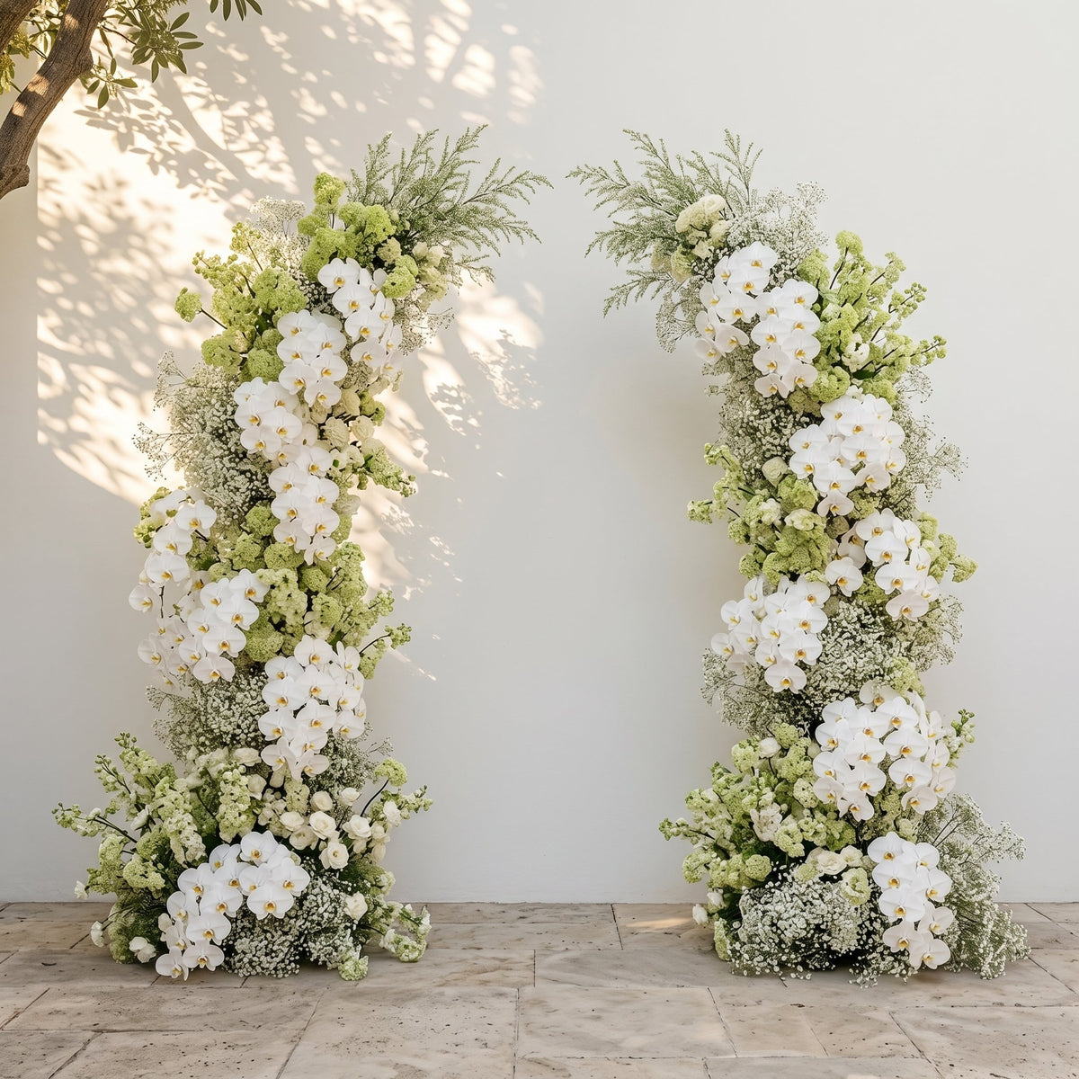 Maellyra:Ivory White Orchid & Fresh Green Silk Floral Ground Horn Arch Arrangement with Soft Sorelia & Cascading Lush Greenery for Romantic Minimalist Weddings & Garden Event Decor Frame Included