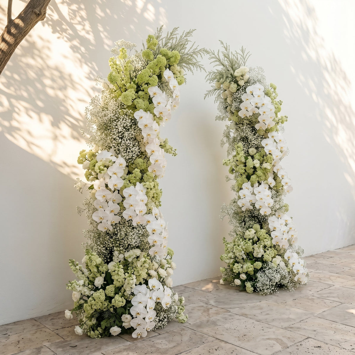 Maellyra:Ivory White Orchid & Fresh Green Silk Floral Ground Horn Arch Arrangement with Soft Sorelia & Cascading Lush Greenery for Romantic Minimalist Weddings & Garden Event Decor Frame Included